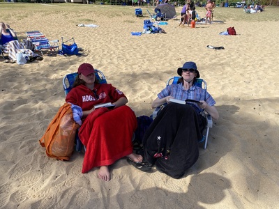 20220614_1615-IMG_7886-Kauai-AMS_ERS_reading_on_beach